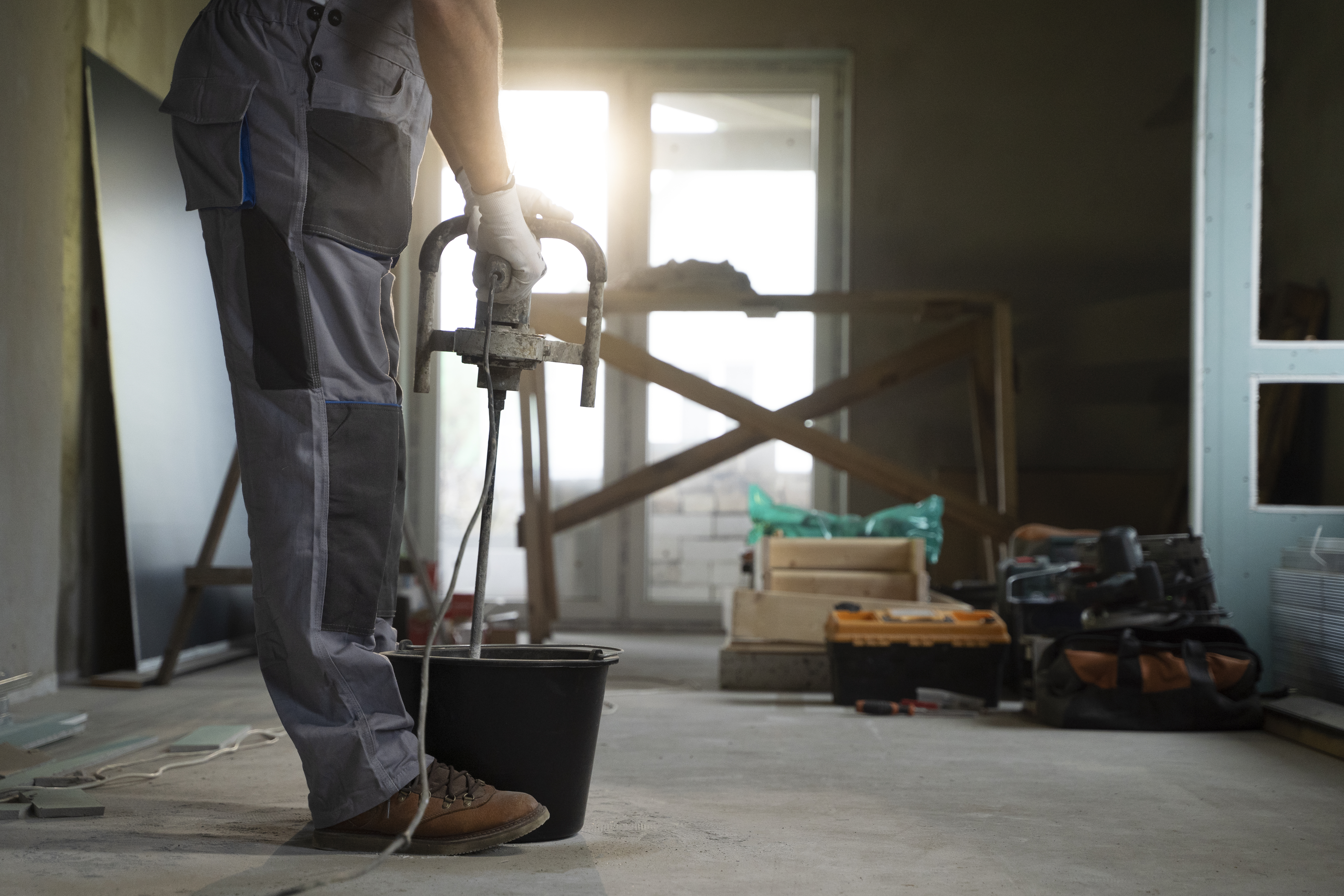 tiler working renovation apartment
